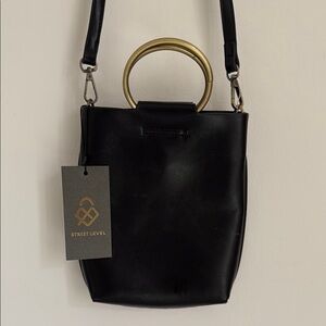 Street Level Black Crossbody Bag with Gold Ring Handle